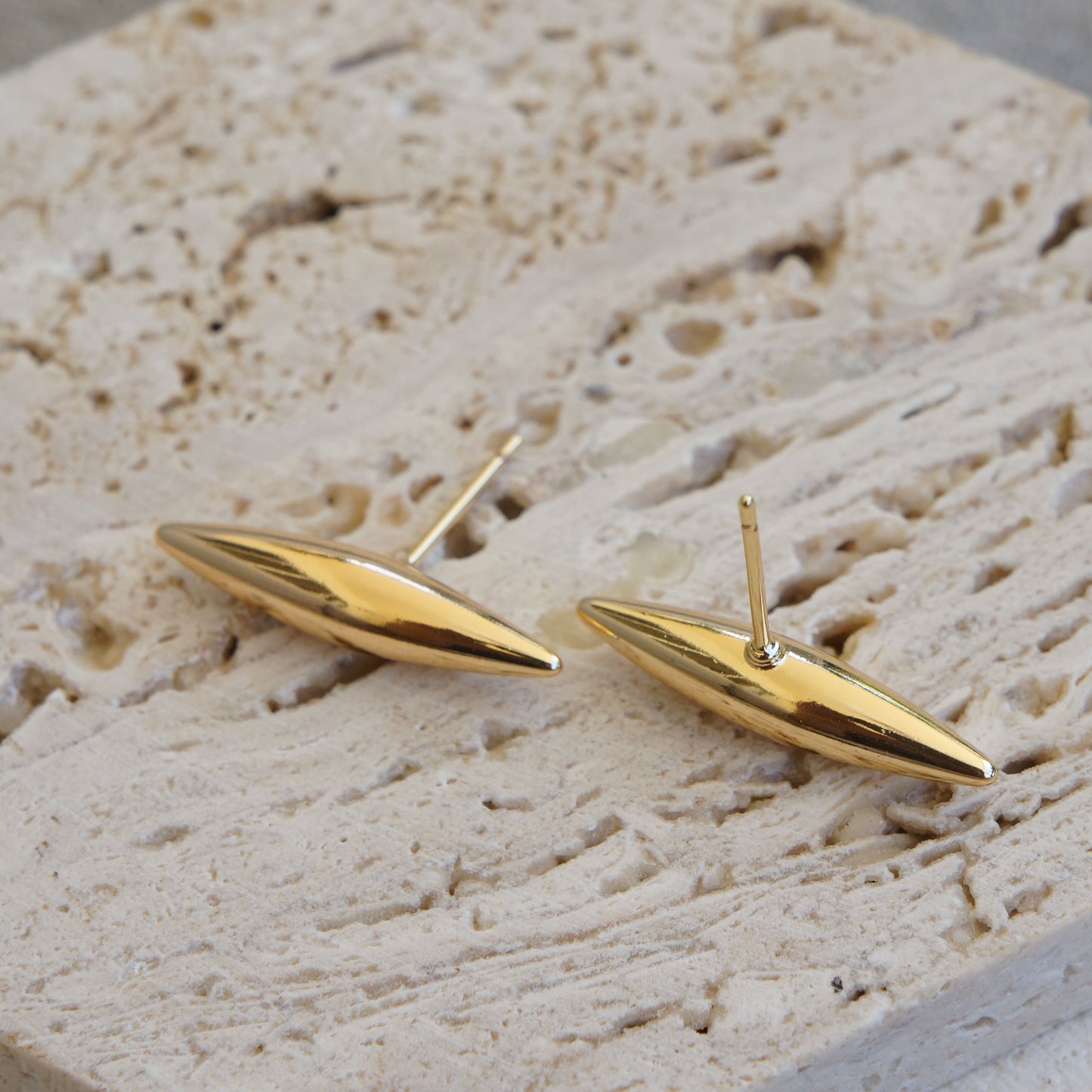 Elongated Gold Geometric Posts