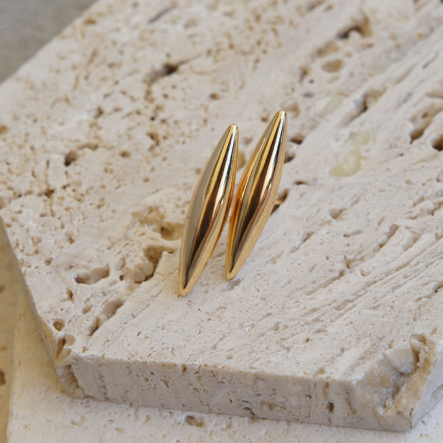 Elongated Gold Geometric Posts