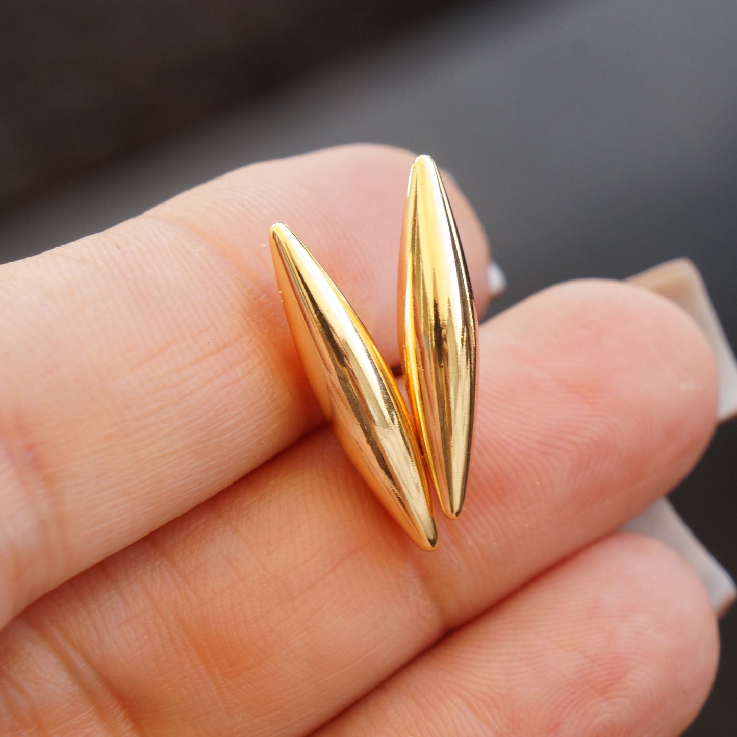 Elongated Gold Geometric Posts