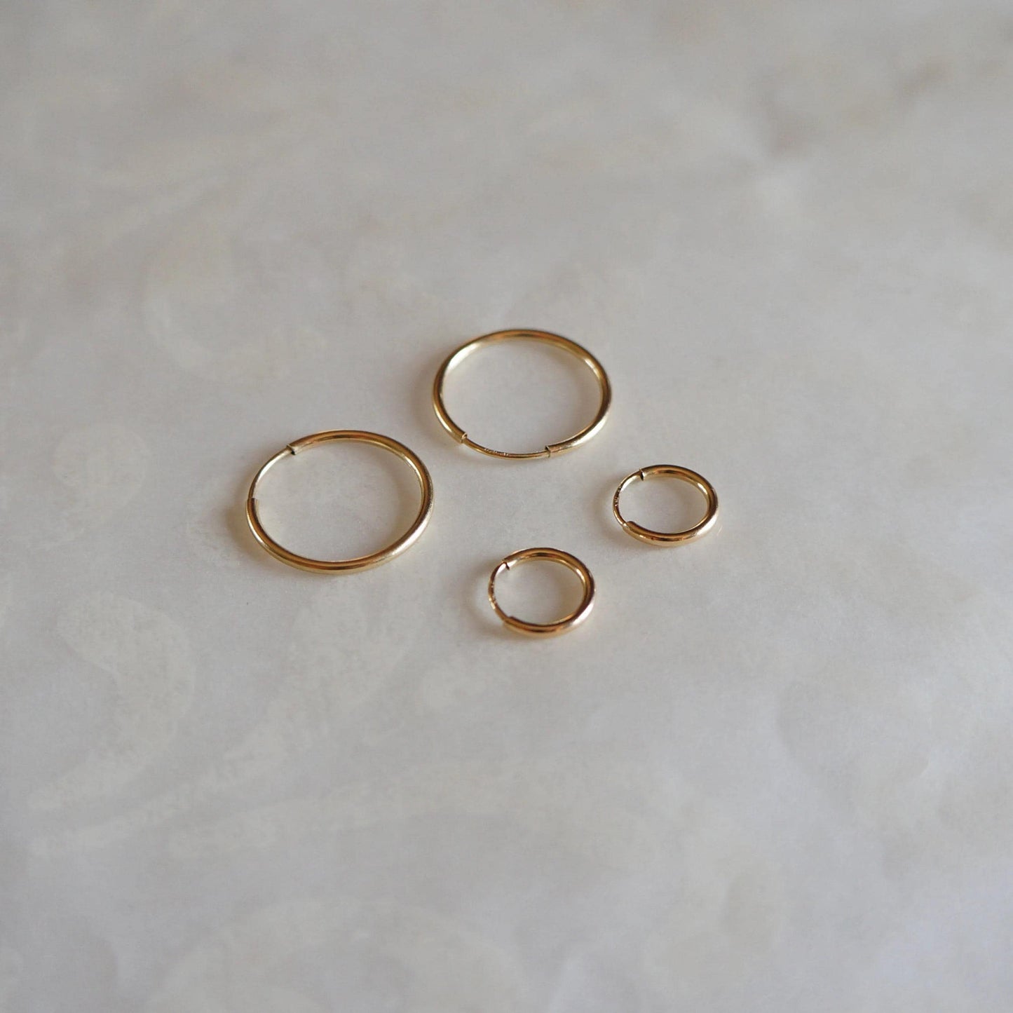 Tiny Hoop Earrings Cartilage Earrings 14kt GOLD FILLED Endless Hoops Tiny Gold Hoop Earrings Sleeper Earrings Minimalist Tiny Gold Earrings